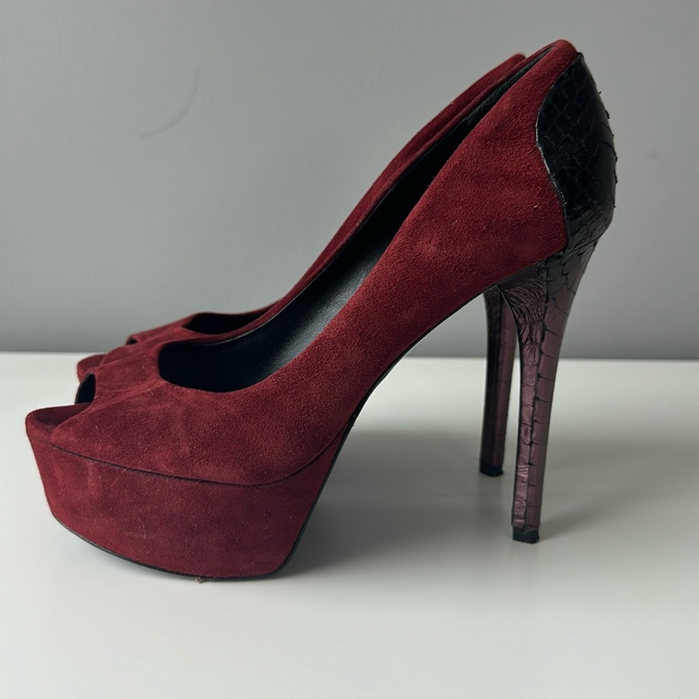 Brian Atwood platform peep toe pumps with snake skin accent on back of heel